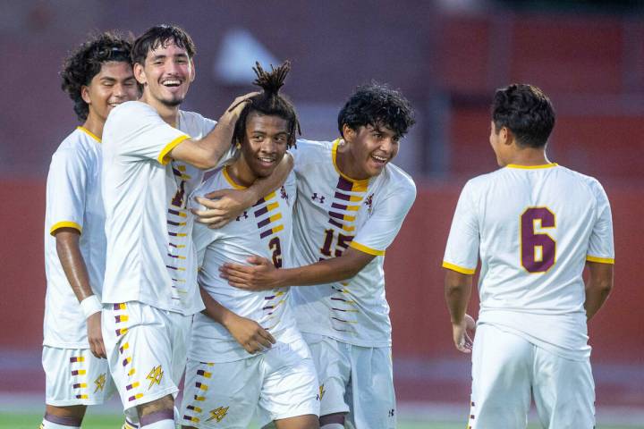 Eldorado forward Eric Hodges (2) is celebrated by teammates for another goal over Legacy during ...