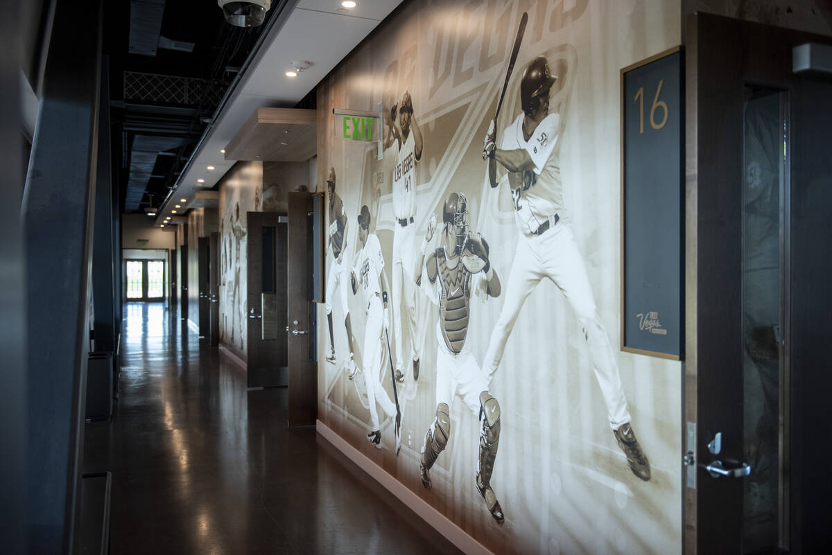 A mural showcasing the history of minor league baseball in Las Vegas is behind the box suites a ...