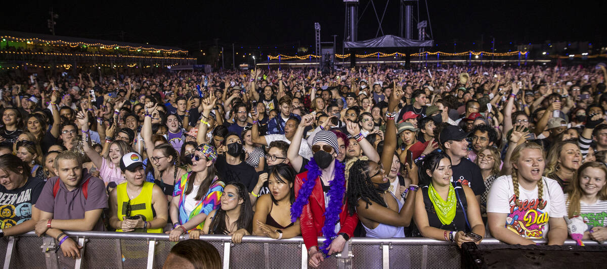 Fans sing and dance as Green Day performs on the Downtown Stage during day two of Life is Beaut ...