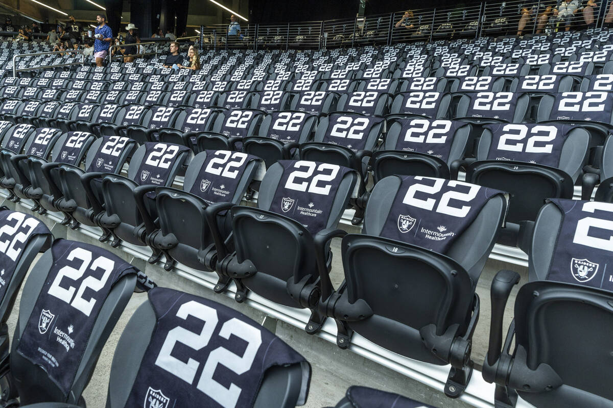 Raiders fans each receive a ceremonial towel on their seats in honor of player alumni before th ...