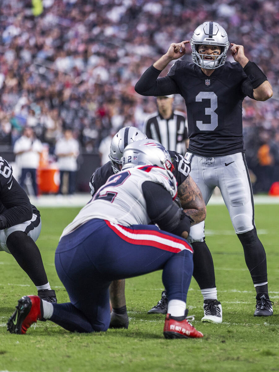 Raiders quarterback Jarrett Stidham (3) calls a play versus the Patriots during the first half ...
