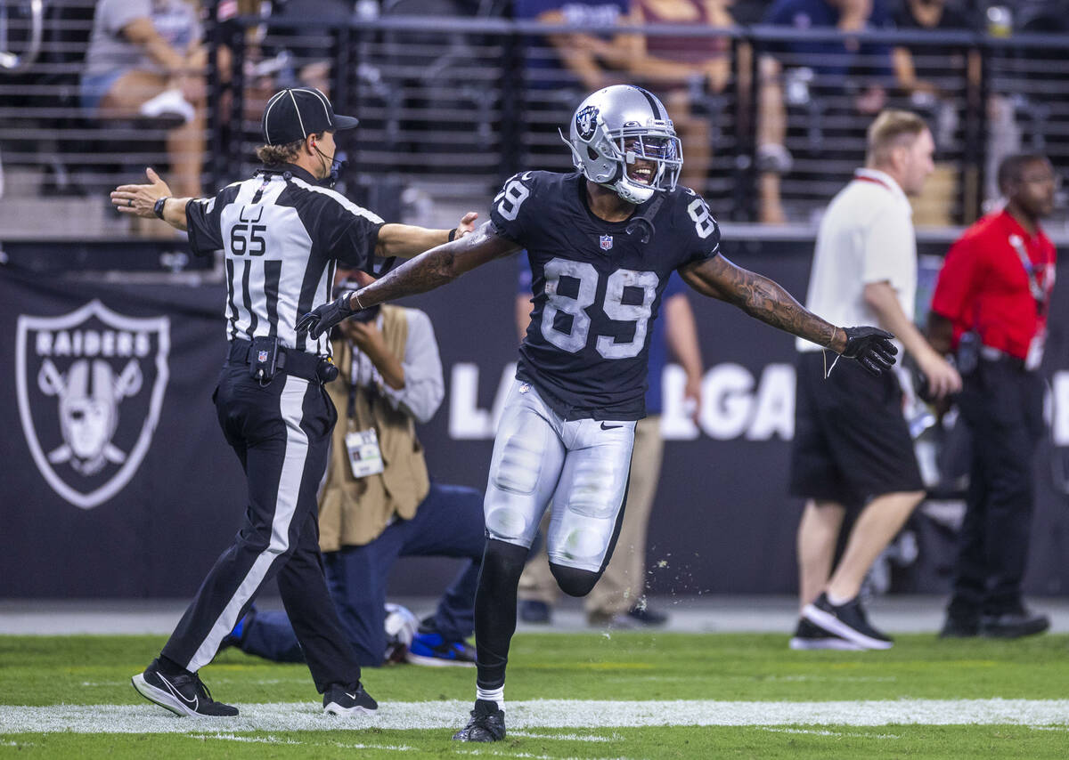 Raiders wide receiver Isaiah Zuber (89) celebrates his interception and run back versus the New ...
