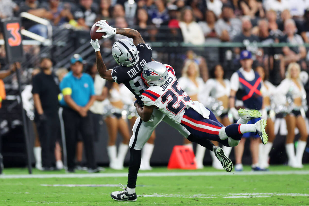 Raiders wide receiver Keelan Cole (84) makes a catch under pressure from New England Patriots c ...