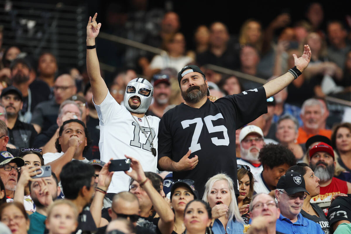 Fans cheer during the first half of their NFL preseason football game at Allegiant Stadium in L ...