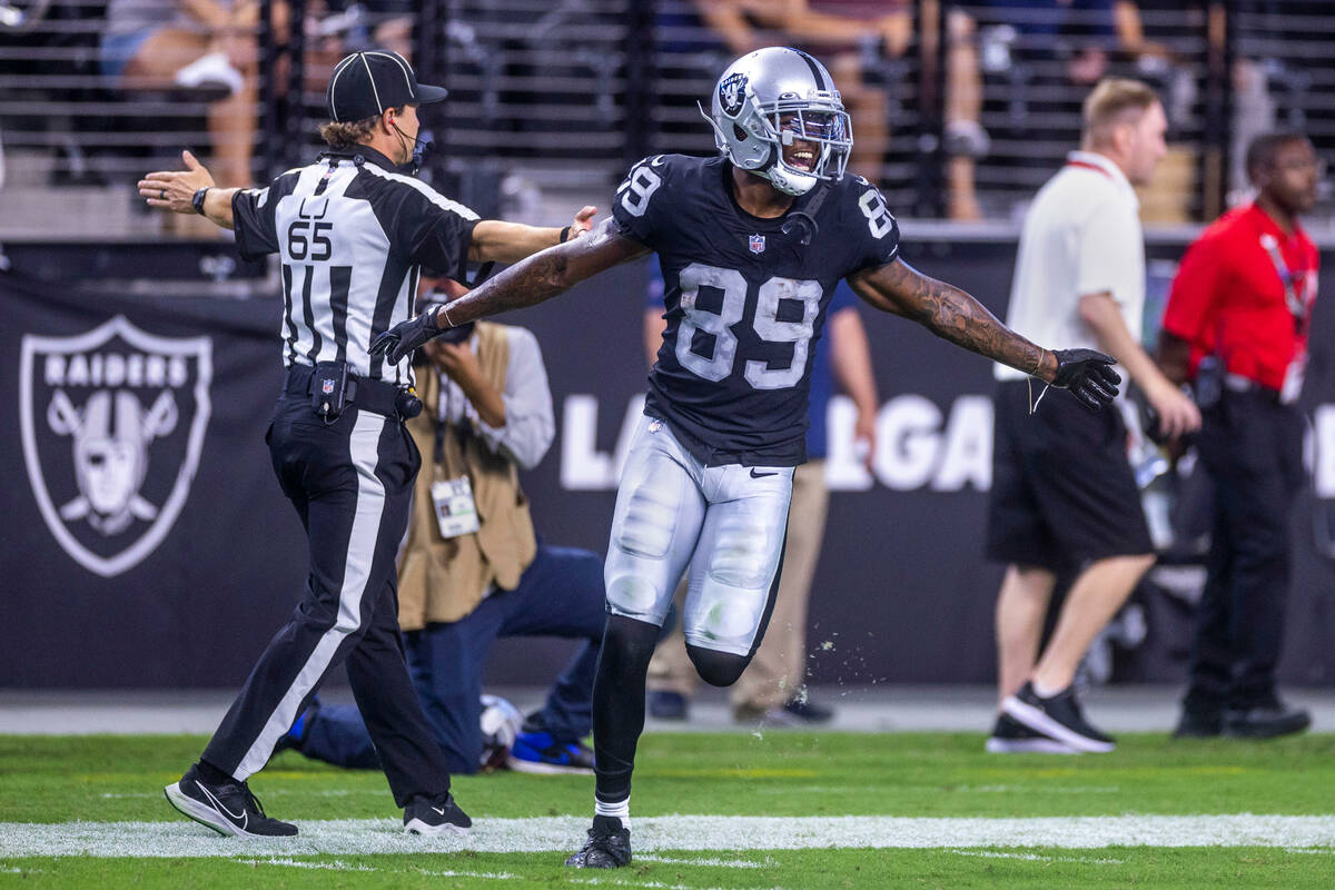 Raiders wide receiver Isaiah Zuber (89) celebrates his interception and run back versus the New ...