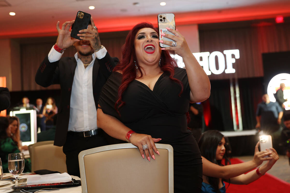 Martha Lopez Vargas cheers for her husband, retired boxer Fernando Vargas, as he honored during ...