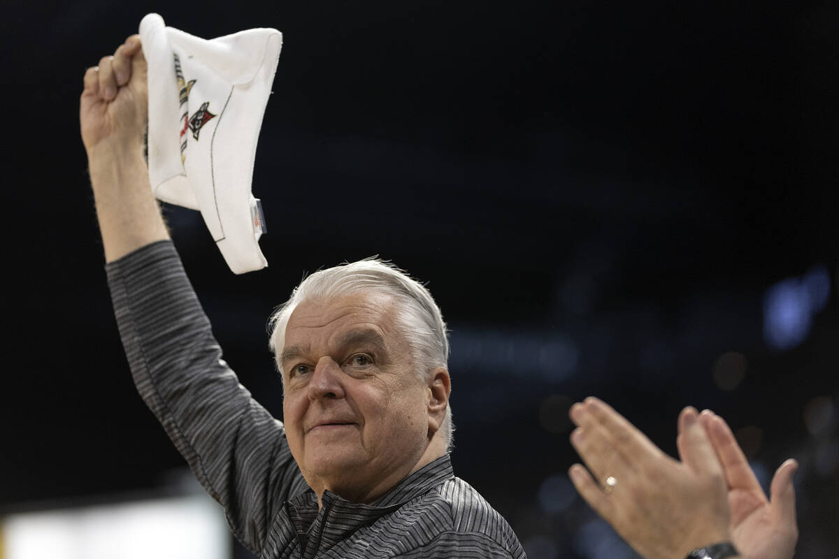 Gov. Steve Sisolak cheers for the Las Vegas Aces during the second half in Game 1 of a WNBA bas ...