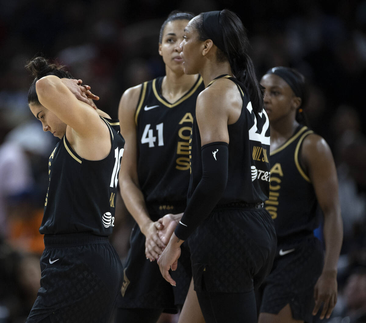 Las Vegas Aces guard Kelsey Plum, left, walks off the court after missing the final shot in Gam ...