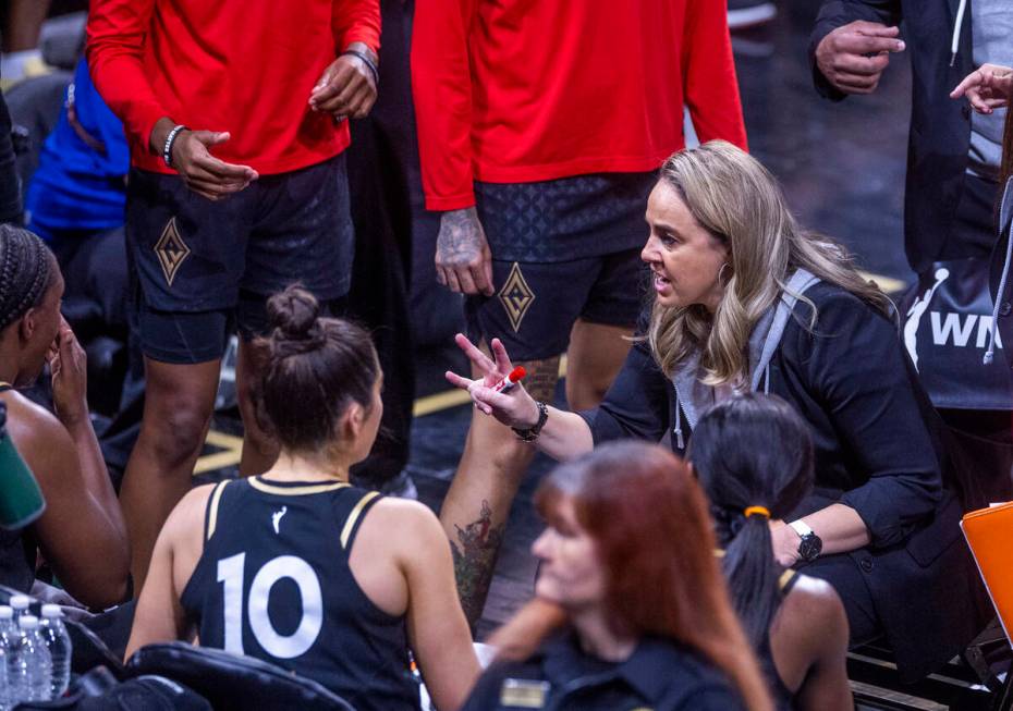 Aces head coach Becky Hammon counsels her players on a timeout during the first half versus Sea ...