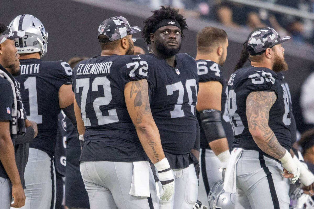Raiders offensive tackle Alex Leatherwood (70) watches on the sideline during the second half o ...