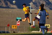 Shadow Ridge’s Nicolas Smyth (3) heads the ball against Silverado during a soccer game a ...