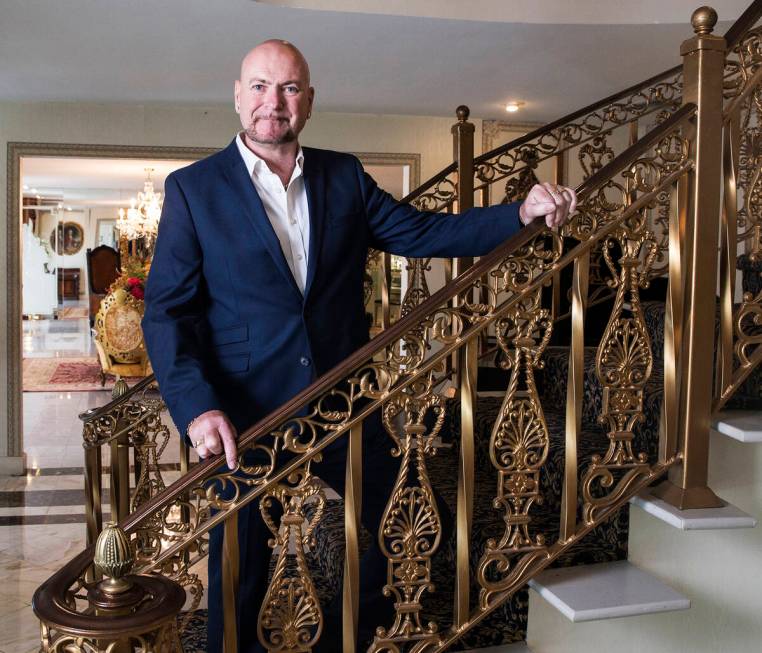 Mansion owner Martyn Ravenhill at the staircase, which was imported from Paris. (Las Vegas Revi ...