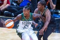 Seattle Storm guard Jewell Loyd (24) steals the ball from Las Vegas Aces guard Chelsea Gray (12 ...