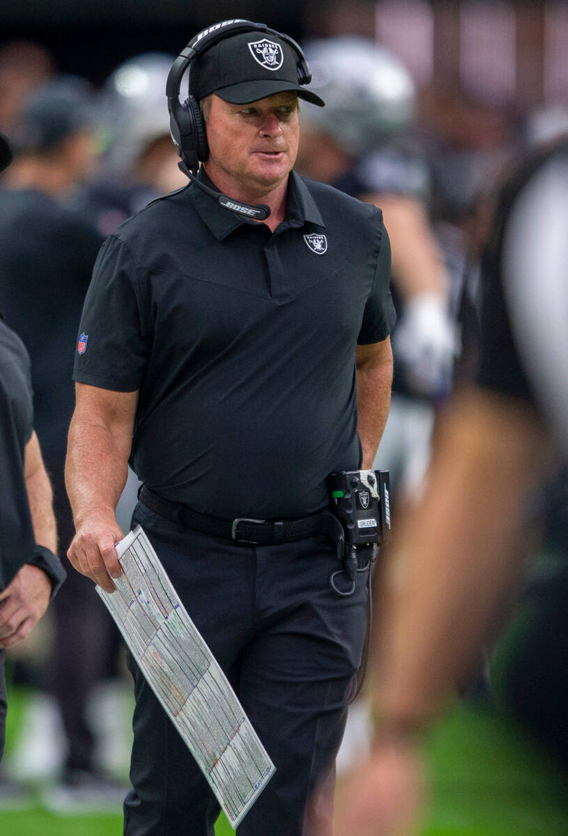 Raiders head coach Jon Gruden looks on from the sideline during the second quarter of an NFL fo ...