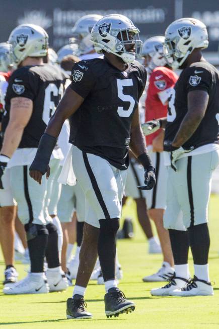 Raiders linebacker Divine Deablo (5) warms up during the team’s training camp practice a ...