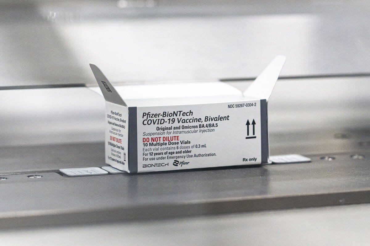 This August 2022 photo provided by Pfizer shows packaging for the company's updated COVID-19 va ...