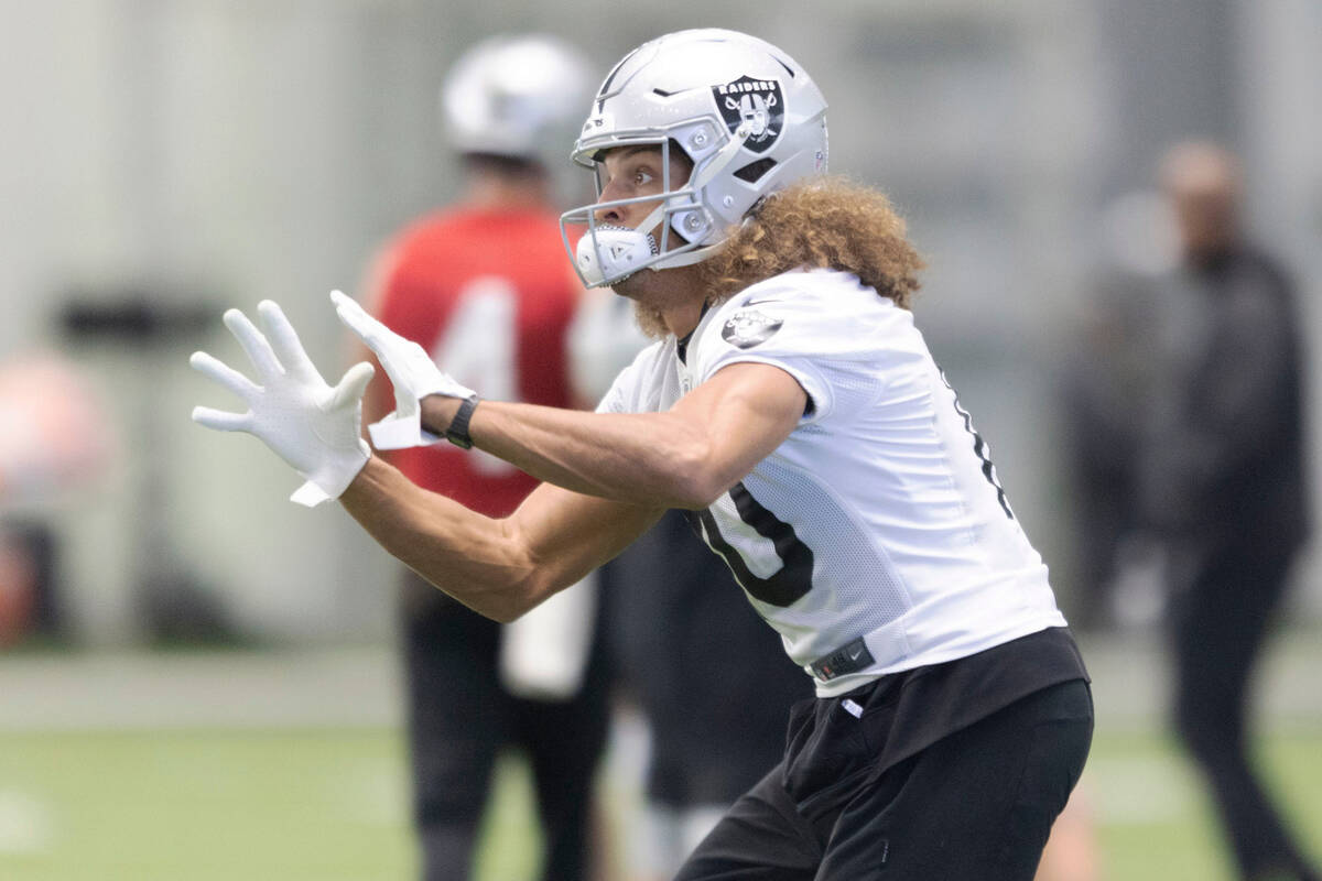 Raiders wide receiver Mack Hollins (10) prepares to make a catch during practice at the Intermo ...
