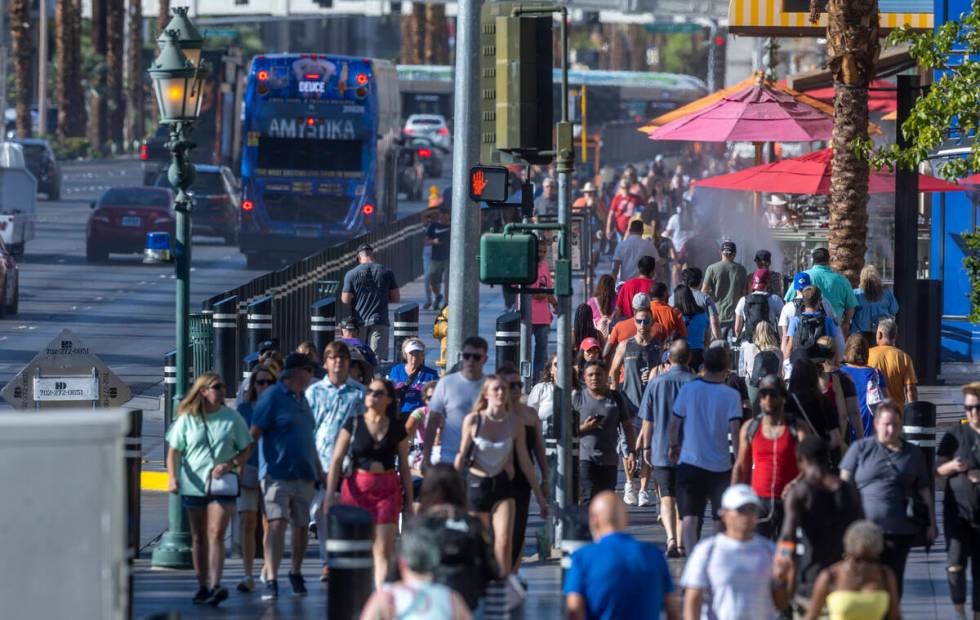 Visitors take to the Las Vegas Strip as Labor Day weekend approaches on Wednesday, Aug. 31, 202 ...