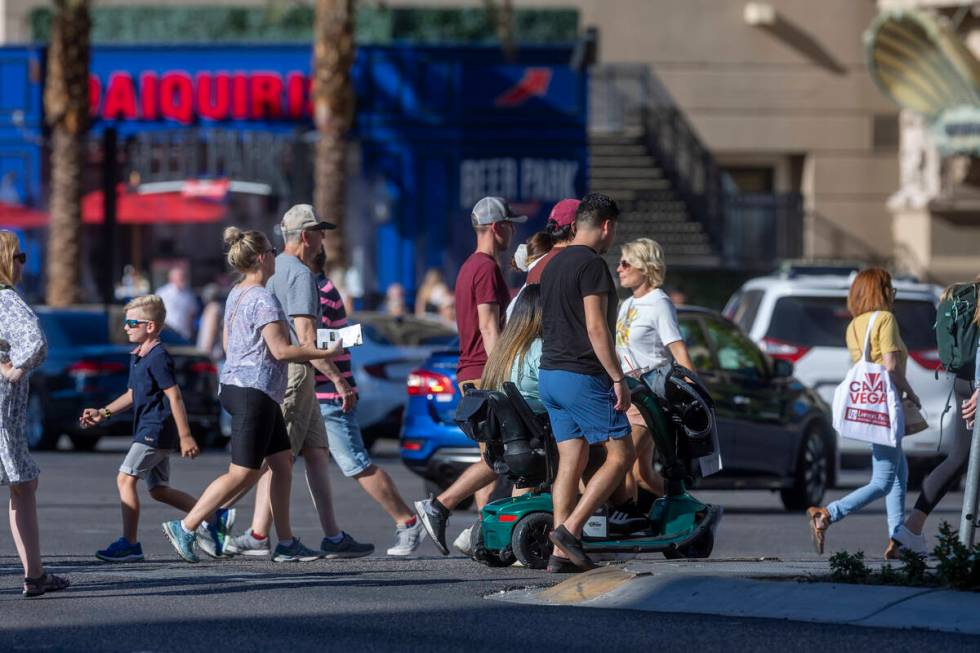 Visitors take to the Las Vegas Strip as Labor Day weekend approaches on Wednesday, Aug. 31, 202 ...