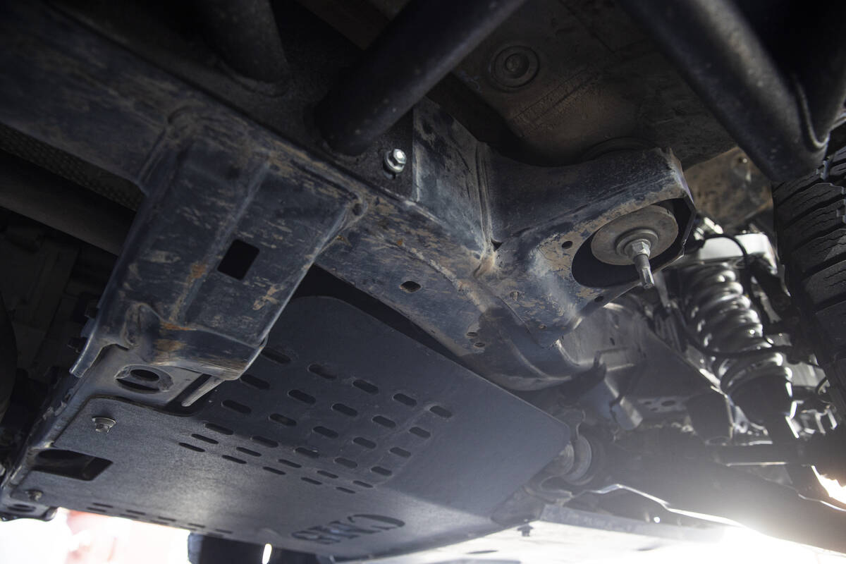 A cover for a catalytic converters to prevent theft is pictured on a Toyota Tundra outside of C ...