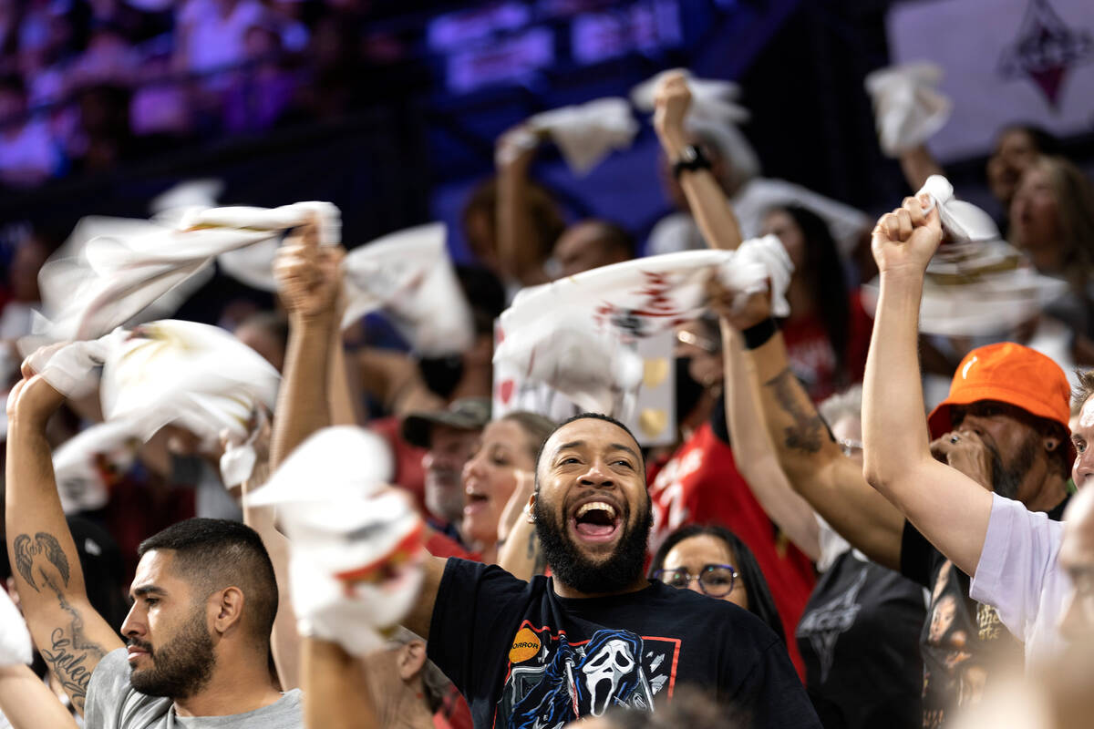 Las Vegas Aces fans go wild for their team during the first half in Game 2 of a WNBA basketball ...