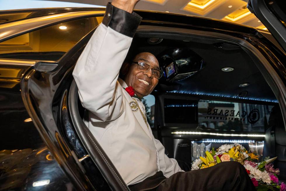 Benny Figgins waves as he leaves Caesars Palace in a limo ride home after completing his last d ...