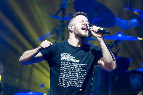 Imagine Dragons frontman Dan Reynolds performs during a show for the bands' new album "Origins" ...