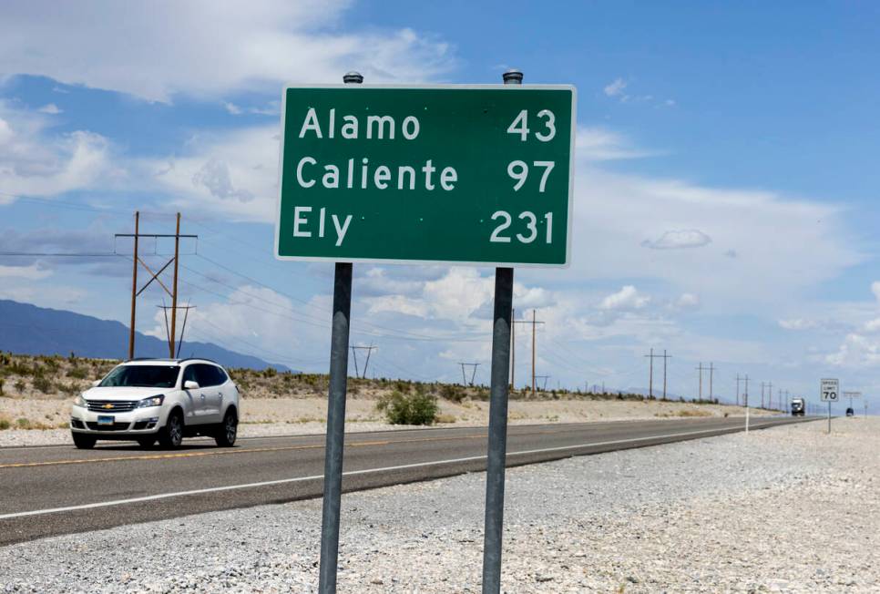 A highway distance sign is posted near Coyote Springs golf course on Wednesday, Aug. 10, 2022, ...