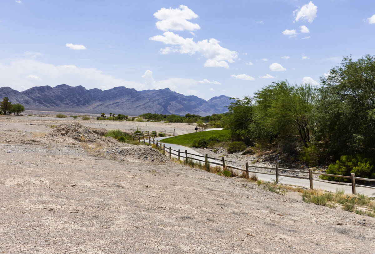 A vacant land, left, for a proposed Coyote Springs development is seen near Coyote Springs Golf ...