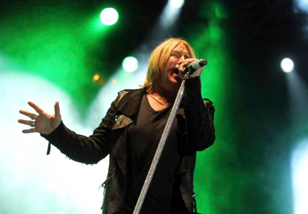 FILE - This June 8, 2012 file photo shows Joe Elliott performing with the band Def Leppard at t ...