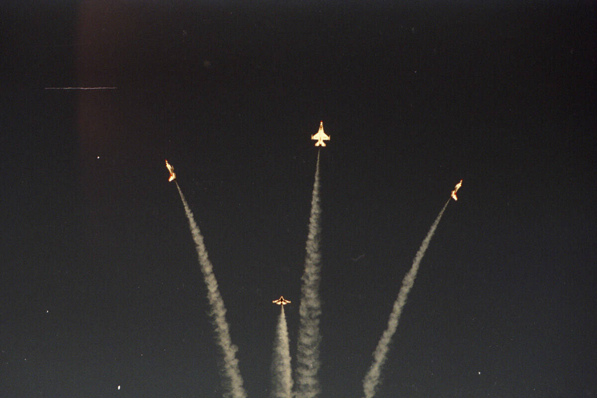 The Air Force's demonstration fliers, the Thunderbirds, practicing at the end of their 40th yea ...