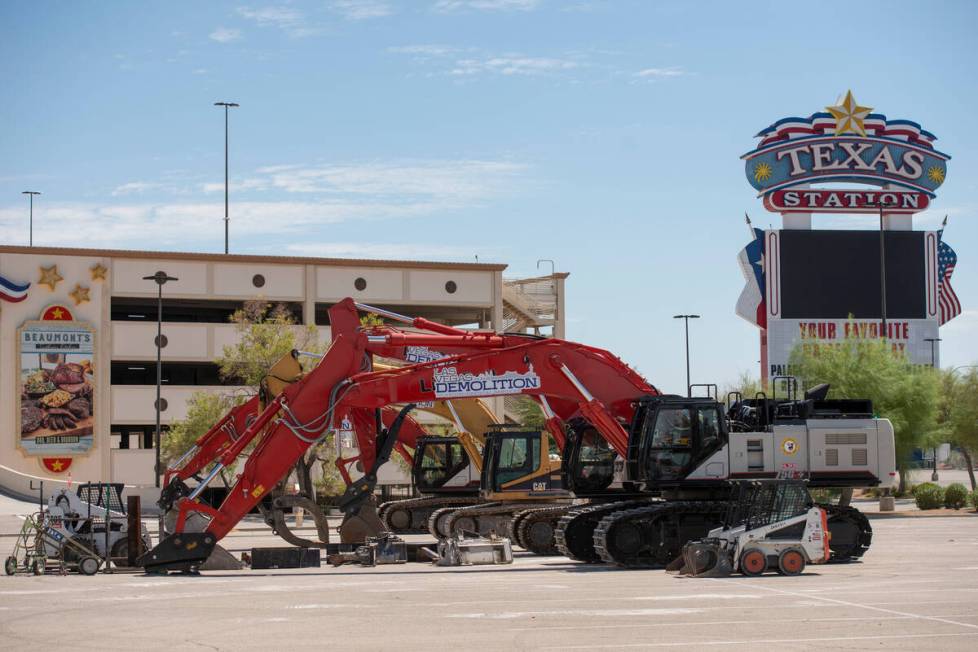 Heavy machinery is staged in the parking lot of the Texas Station hotel-casino at Rancho Drive ...