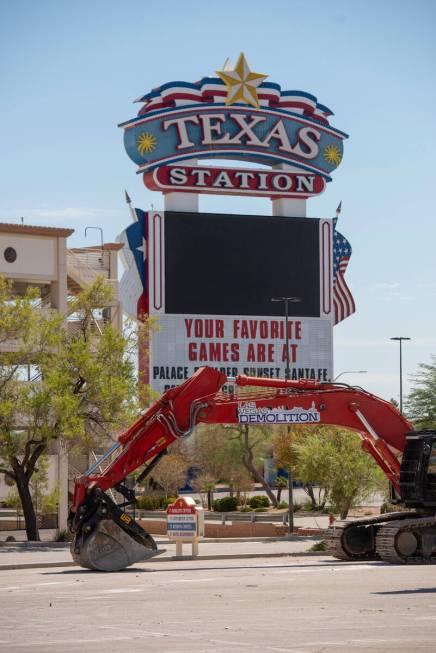 Heavy machinery is staged in the parking lot of the Texas Station hotel-casino at Rancho Drive ...