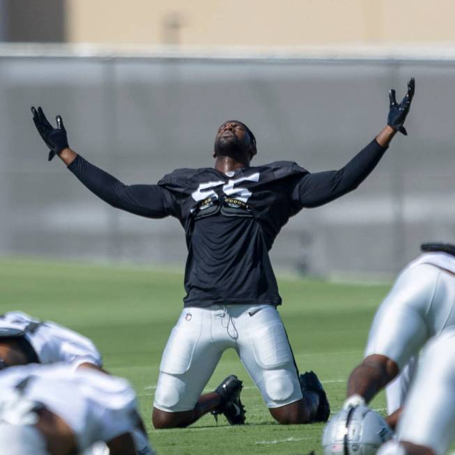 Raiders defensive end Chandler Jones (55) stretches during practice at the Intermountain Health ...