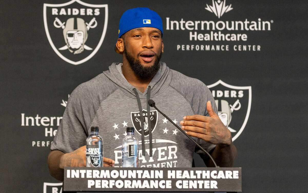 Raiders defensive end Clelin Ferrell answers questions during a news conference at the Intermou ...