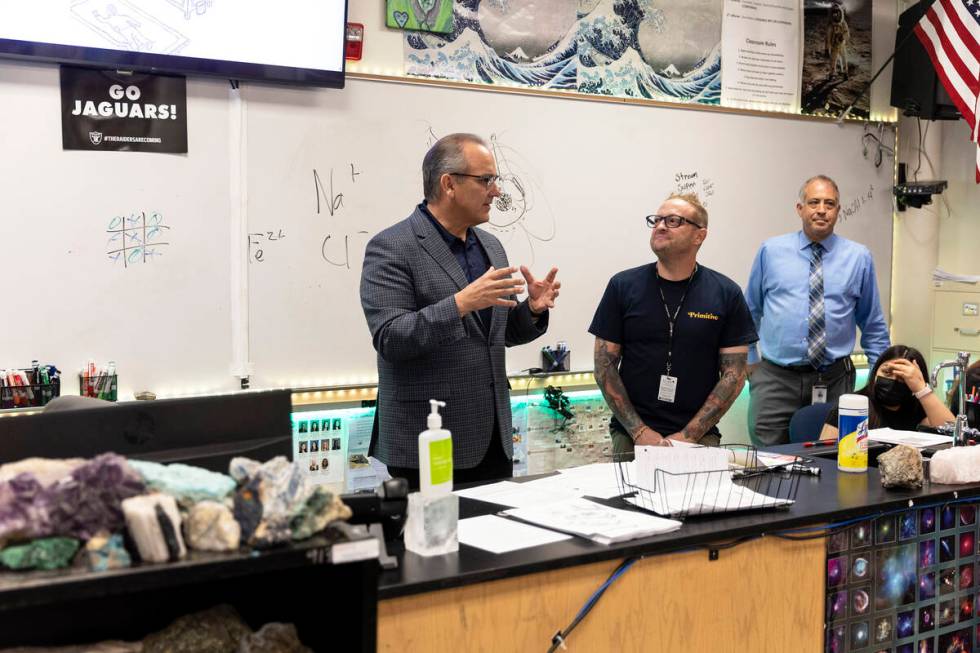 Superintendent Jesus Jara presents science teacher Jeremy Lawson with the 2022 Teacher of the Y ...