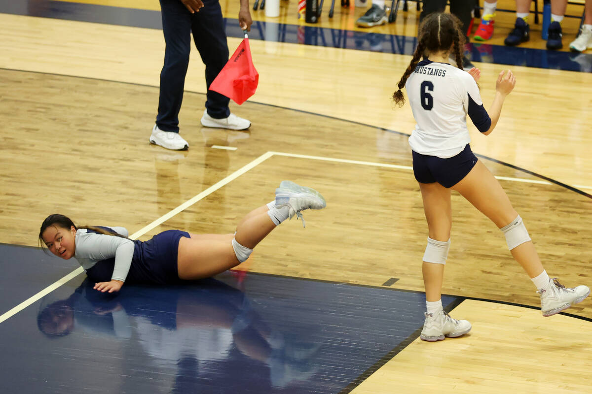 Shadow Ridge's Chloe Poort (6) looks on as Aivry Makaiwi (2) takes a fall while attempting to s ...