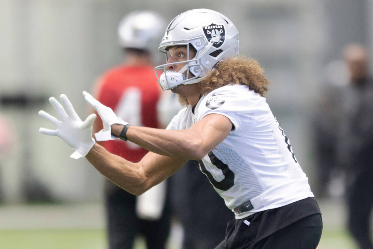 Raiders wide receiver Mack Hollins (10) prepares to make a catch during practice at the Intermo ...