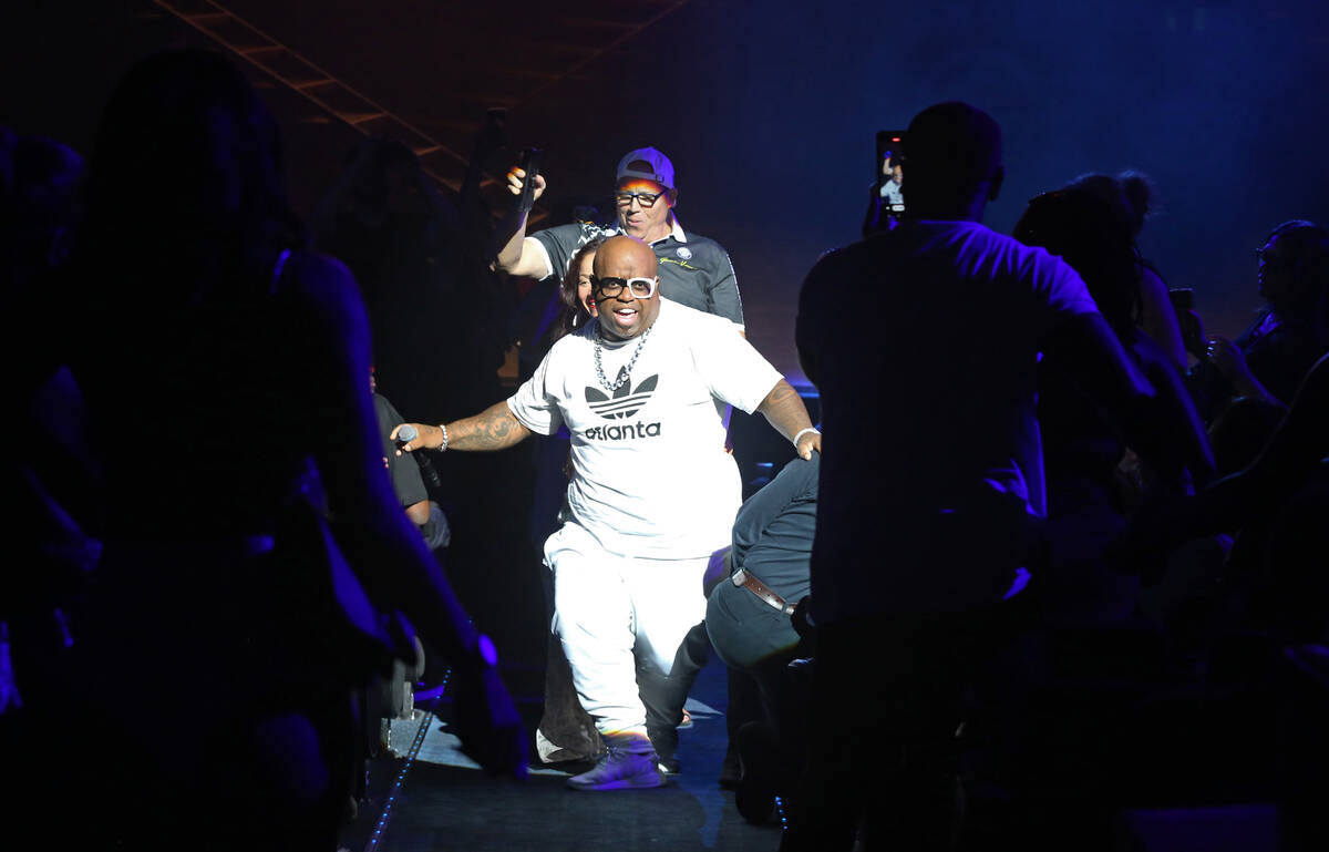 Recording artist CeeLo Green (C) starts a Conga line during the premiere of "Boombox! A Vegas R ...