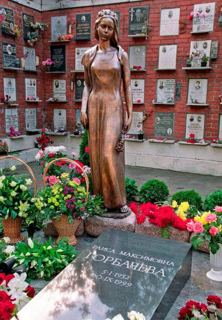 FILE - A monument to Raisa Gorbachev, wife former Soviet President Mikhail Gorbachev stands beh ...