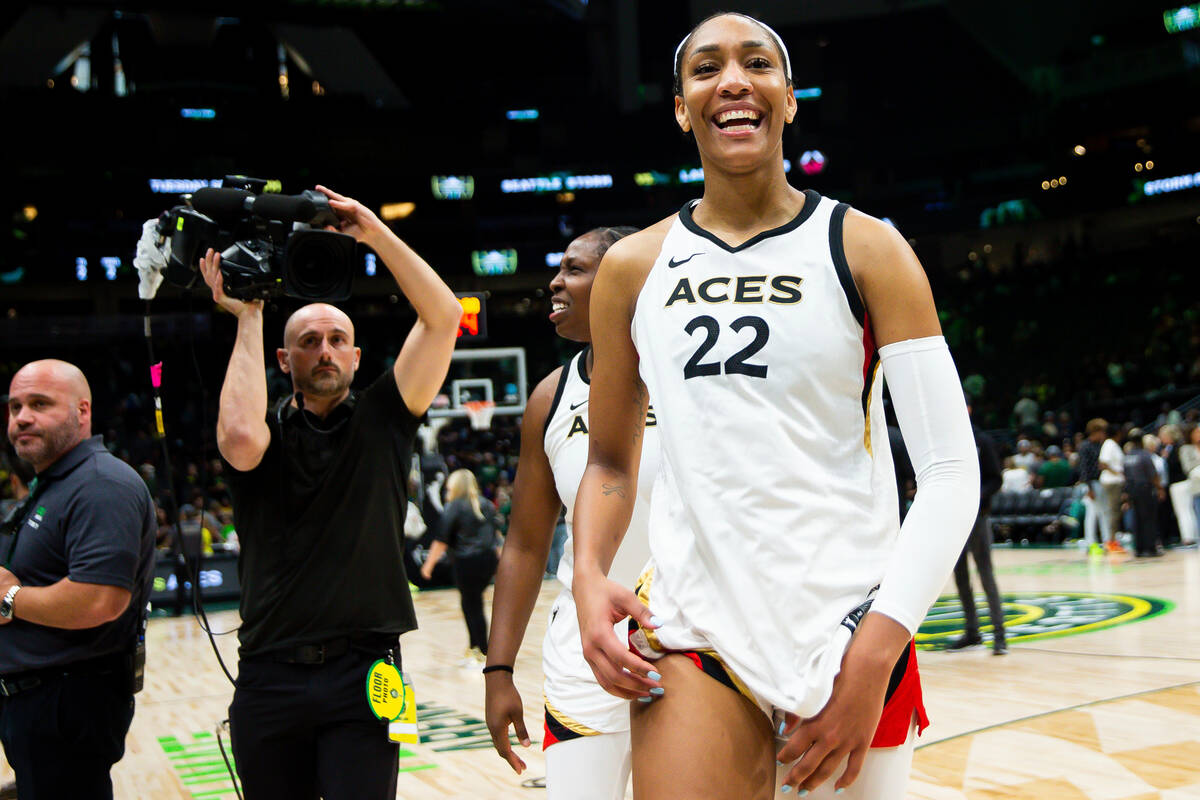 Las Vegas Aces forward A'ja Wilson (22) smiles while walking off the court after winning Game 3 ...