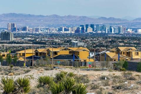 New homes under construction in Las Vegas' Summerlin community on Wednesday, March 30, 2022. (L ...
