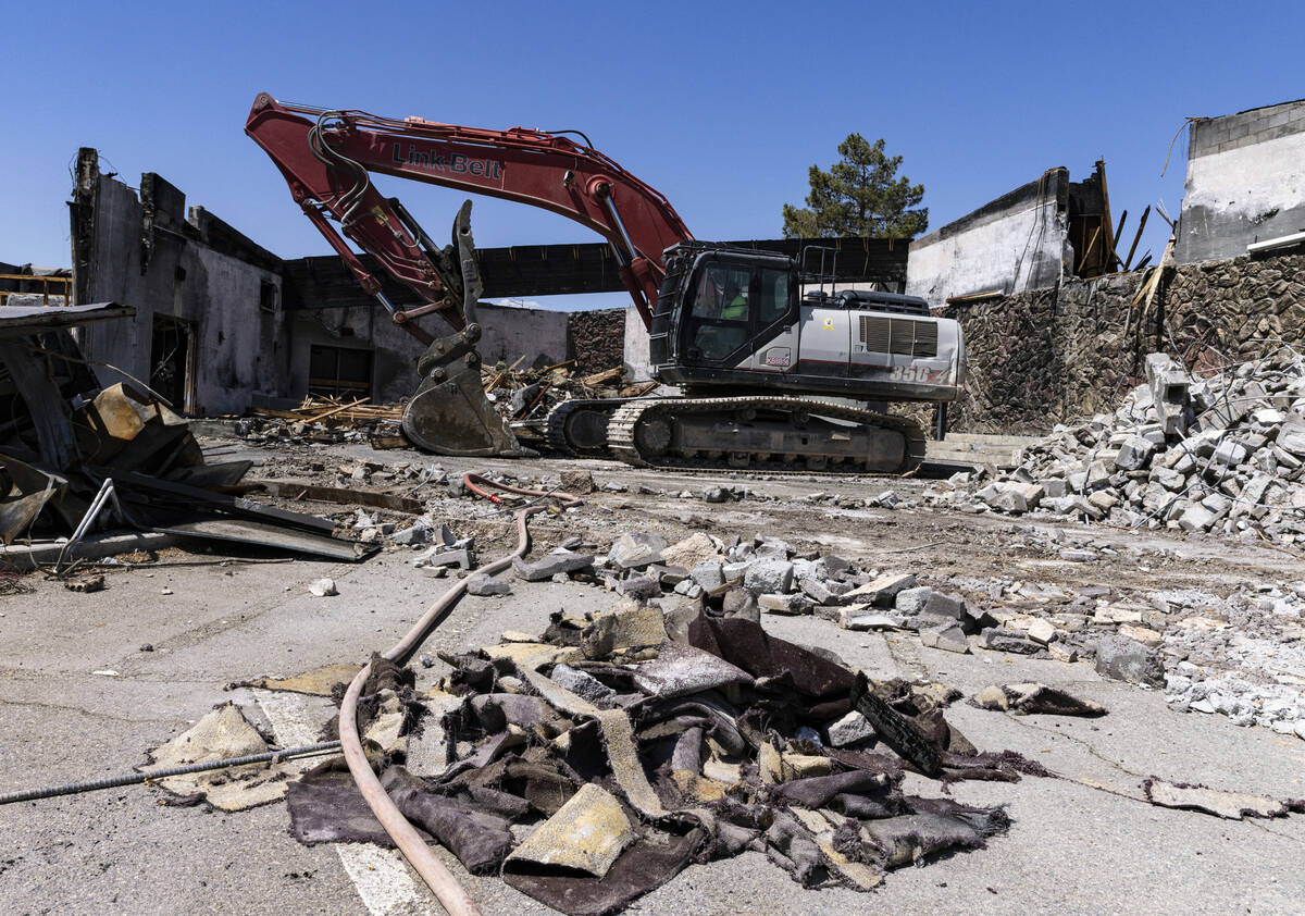 Demolition crews tear down Zion Methodist Church, the burnt sanctuary, on Tuesday, Sept 6, 2022 ...