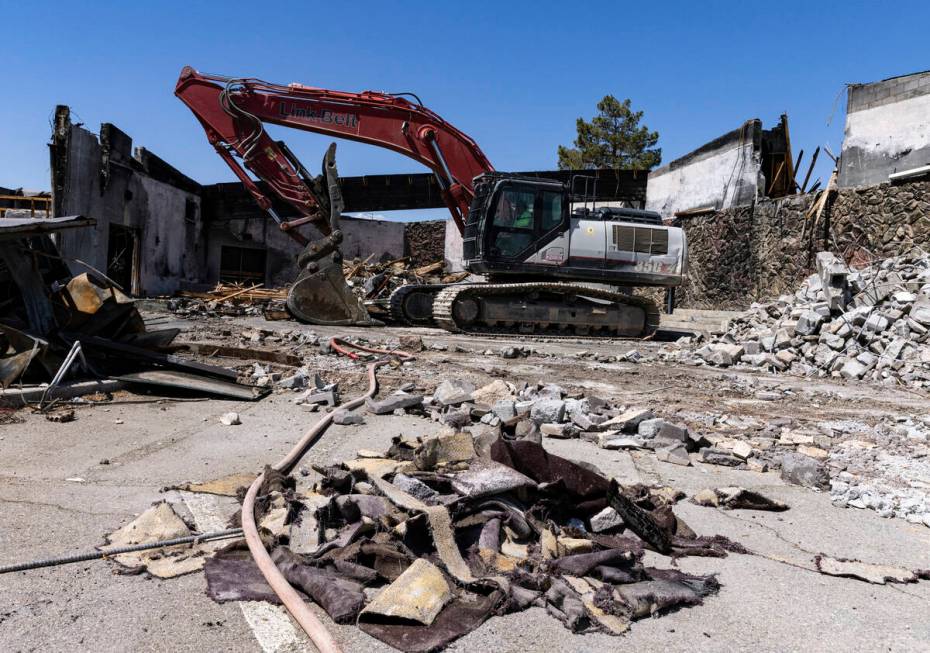 Demolition crews tear down Zion Methodist Church, the burnt sanctuary, on Tuesday, Sept 6, 2022 ...