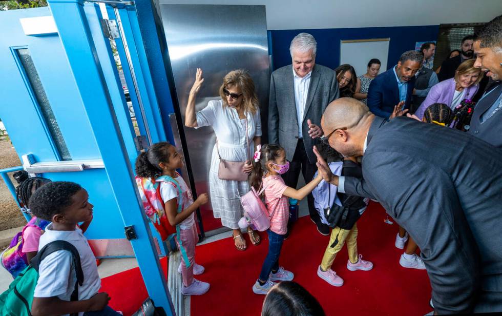 (From left) Nevada Youth Network's Gloria Flores, Gov. Steve Sisolak and Attorney General Aaron ...