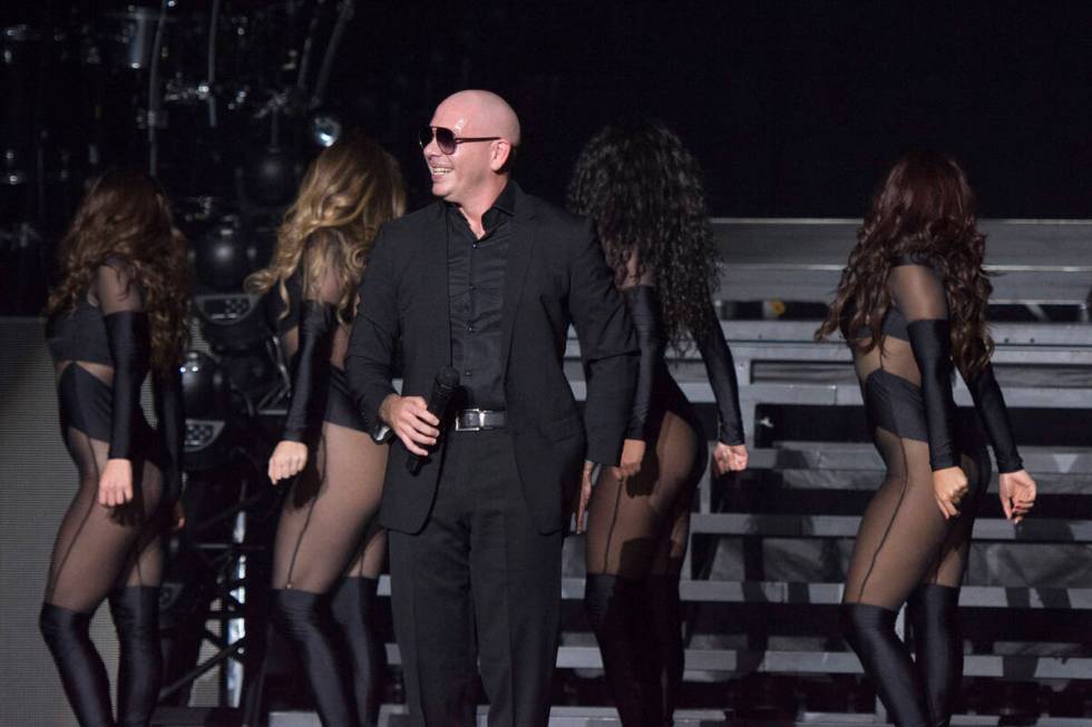 Pitbull performs during the first of a seven-date mini-residency entitled "Time of Our Liv ...