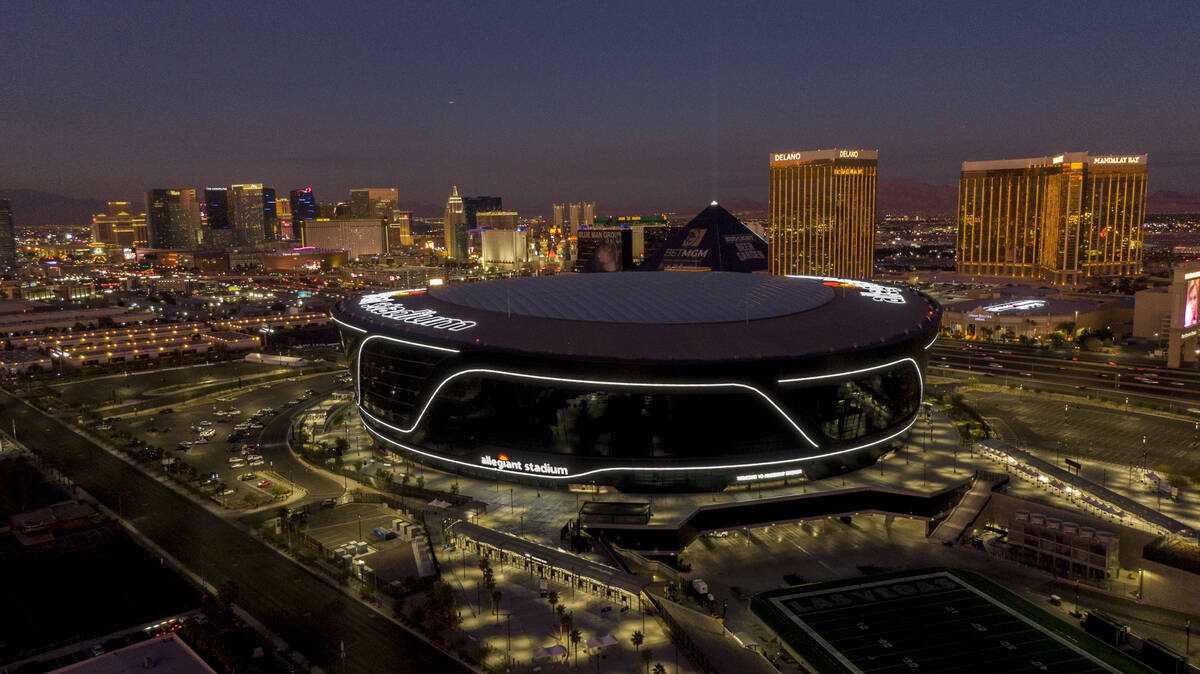 Aerial view of Allegiant Stadium and the Las Vegas Strip at dusk on Thursday, January 6, 2022. ...