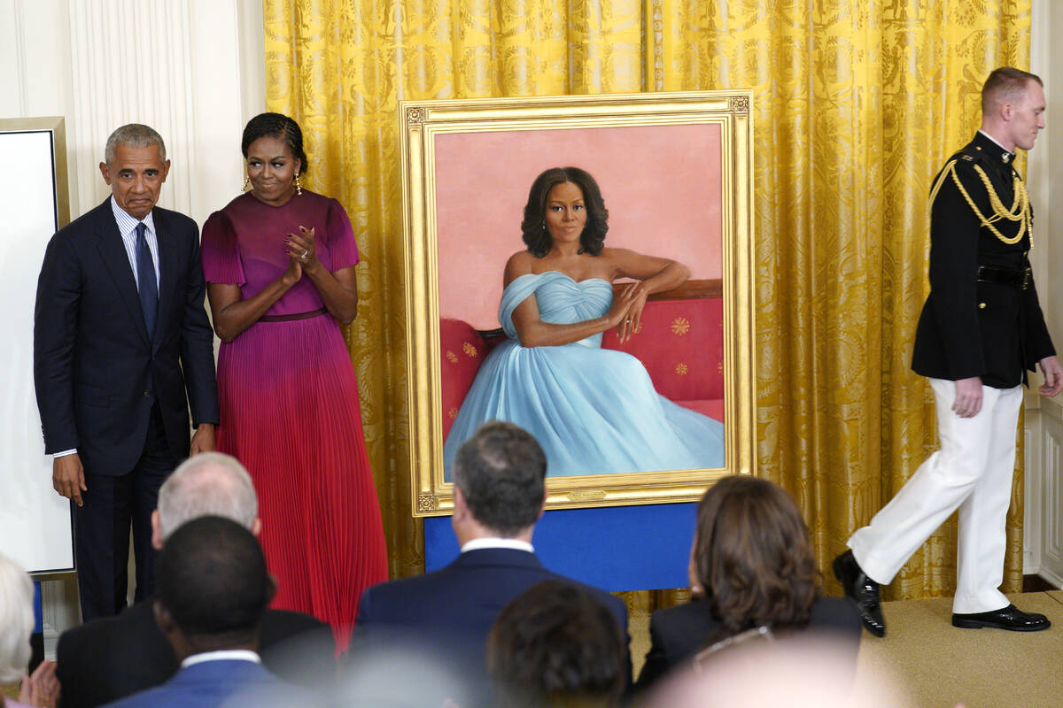 Former President Barack Obama and former first lady Michelle Obama unveil their official White ...