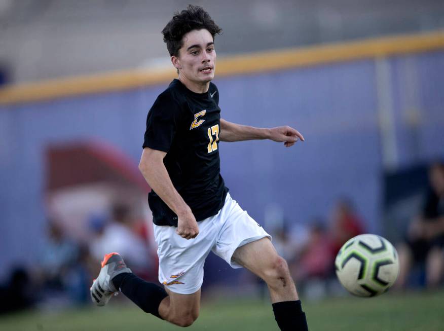 Durango’s Aleksander Benov (17) runs to keep the ball in bounds during a high school soc ...