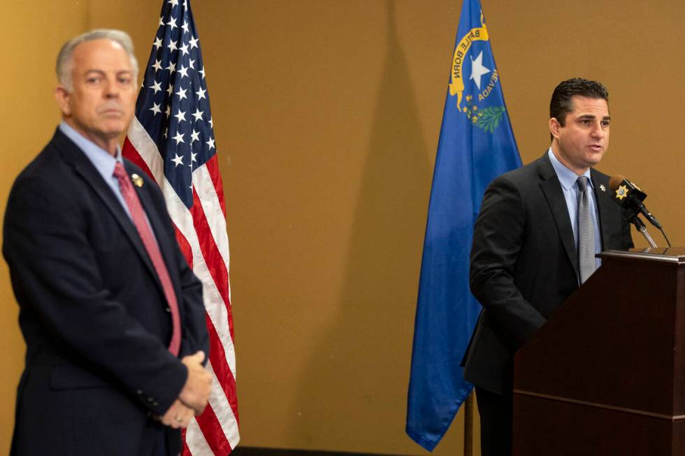 Sheriff Joe Lombardo, left, looks on as Capt. Dori Koren speaks on the arrest of Robert Telles ...